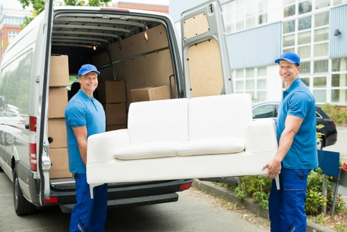 Man and van moving items in West Hampstead street