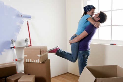 Preparing furniture for West Hampstead house removals in a residential property