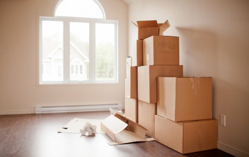 Staff member checking securely stacked storage units