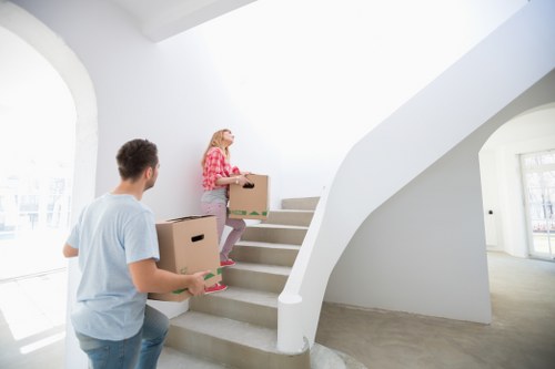 Packed boxes and furniture ready for local relocation services