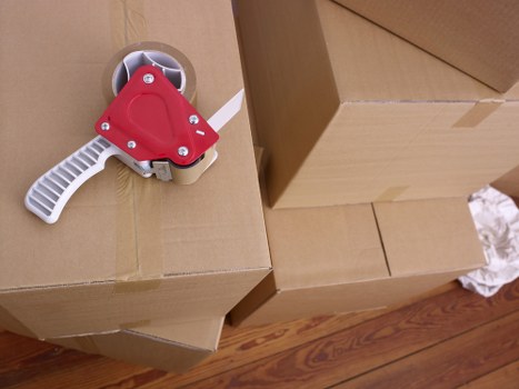 Boxes and furniture prepared for West Hampstead storage during a home transition